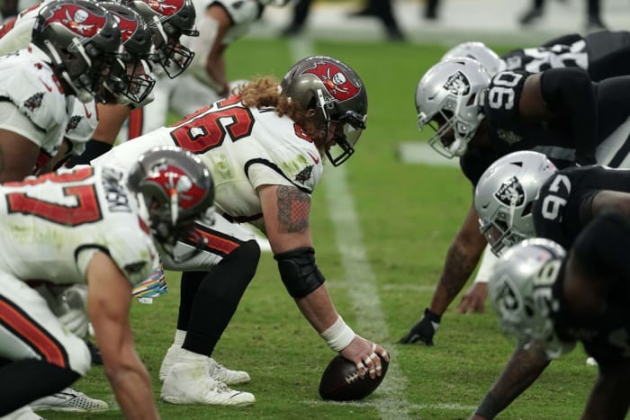 Oct 25, 2020; Paradise, Nevada, USA; A general view of the line of scrimmage as Tampa Bay Buccaneers center Ryan Jensen (66) snaps the ball against the Las Vegas Raiders at Allegiant Stadium. The Buccaneers defeated the Raiders 45-20.
